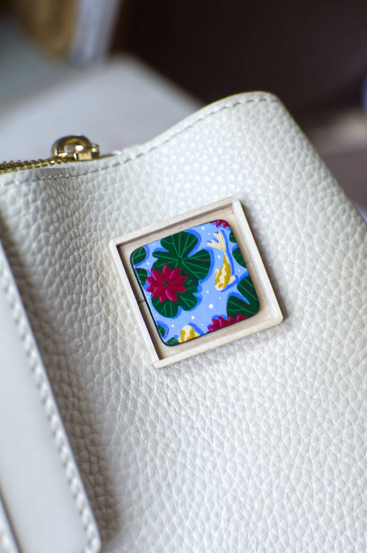 hand-painted lapel pin titled 'Pond'
